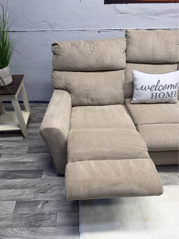 Ashley Furniture Tan Manual Reclining Couch And Loveseat