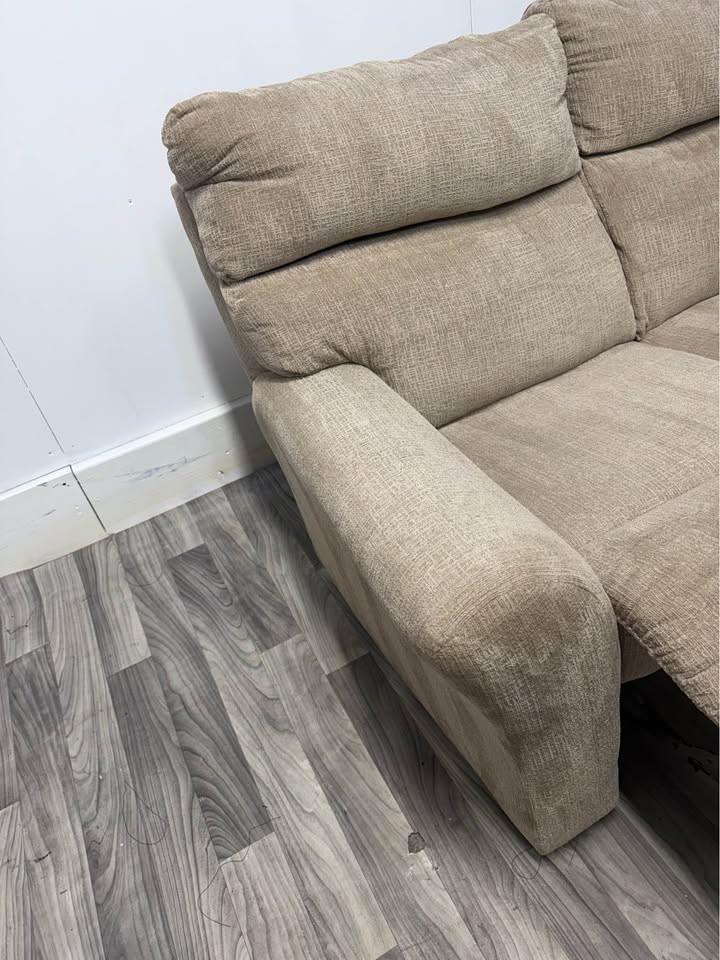 Ashley Furniture Tan Manual Reclining Couch And Loveseat