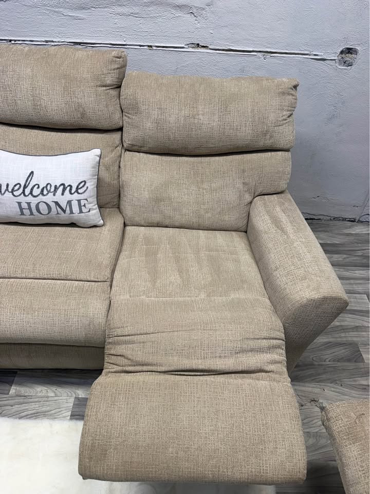 Ashley Furniture Tan Manual Reclining Couch And Loveseat