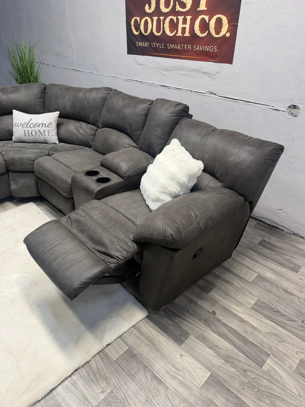 Ashley Furniture Tamboo Gray Reclining Sectional Couch