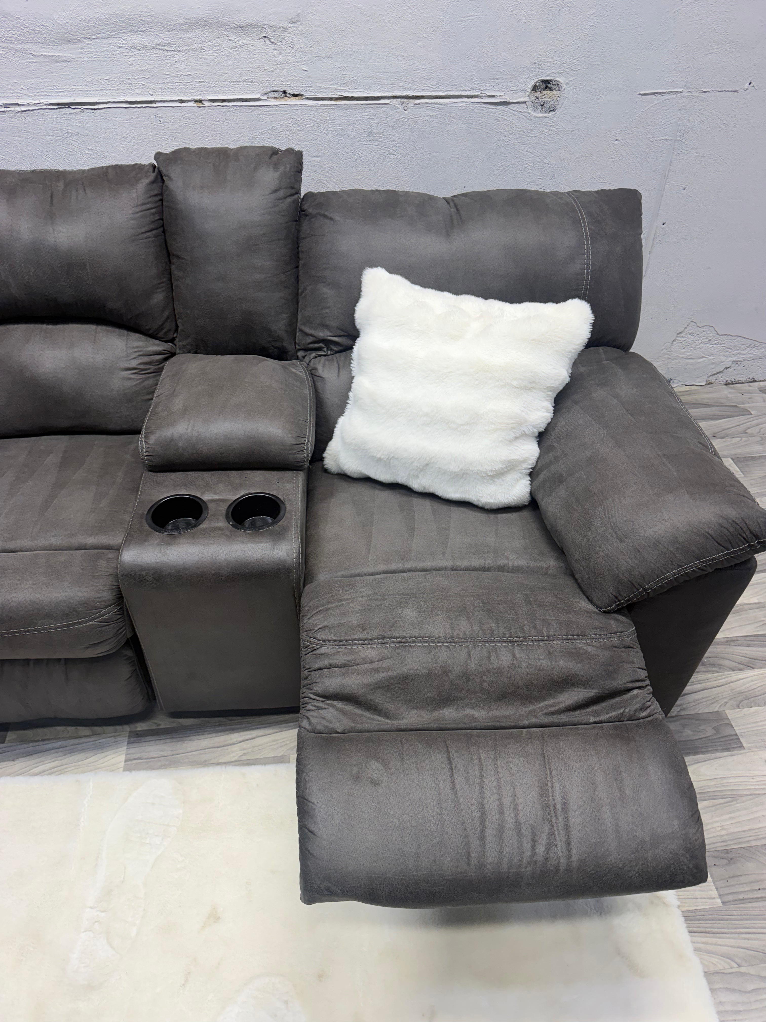 Ashley Furniture Tamboo Gray Reclining Sectional Couch