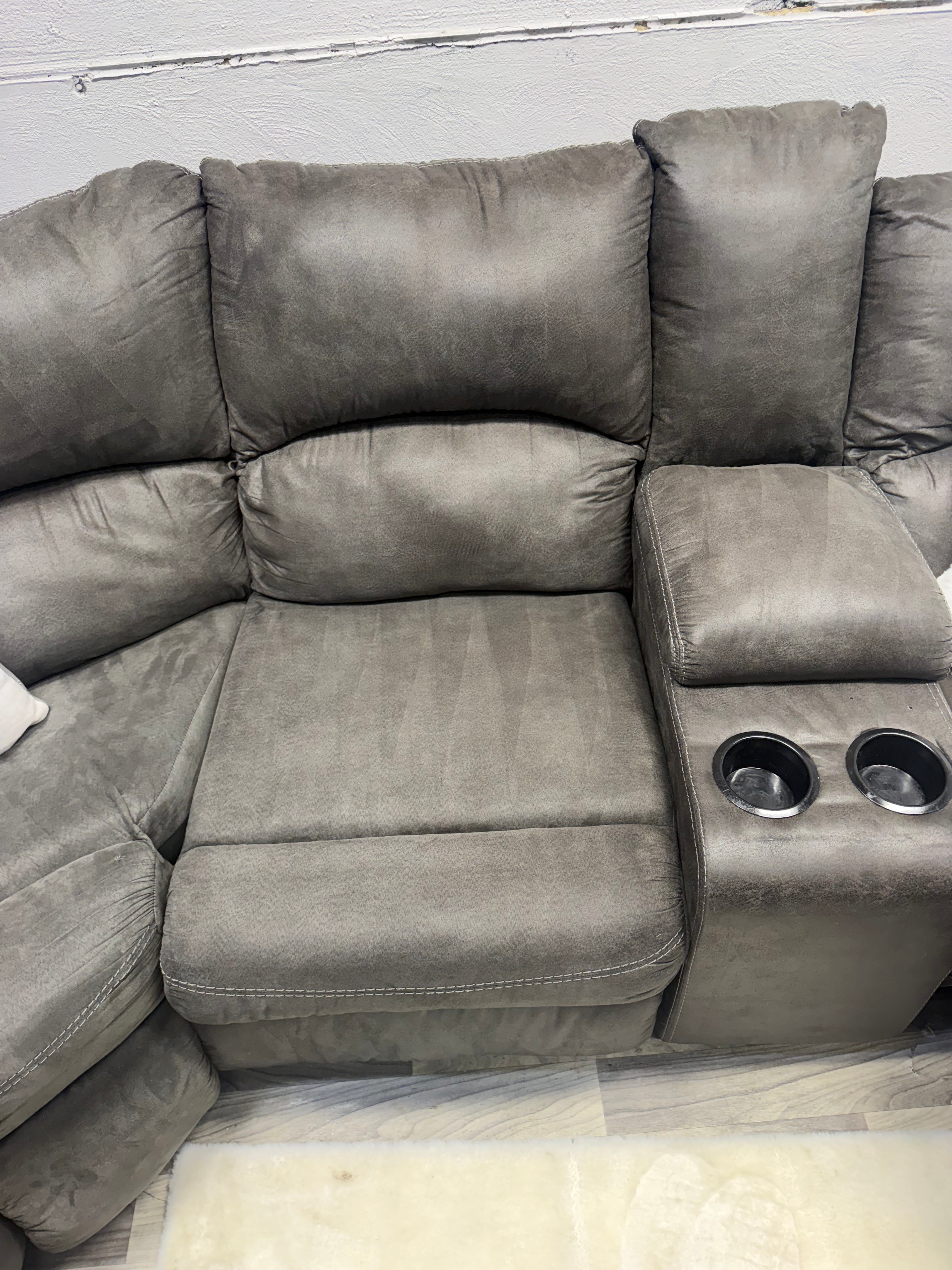 Ashley Furniture Tamboo Gray Reclining Sectional Couch