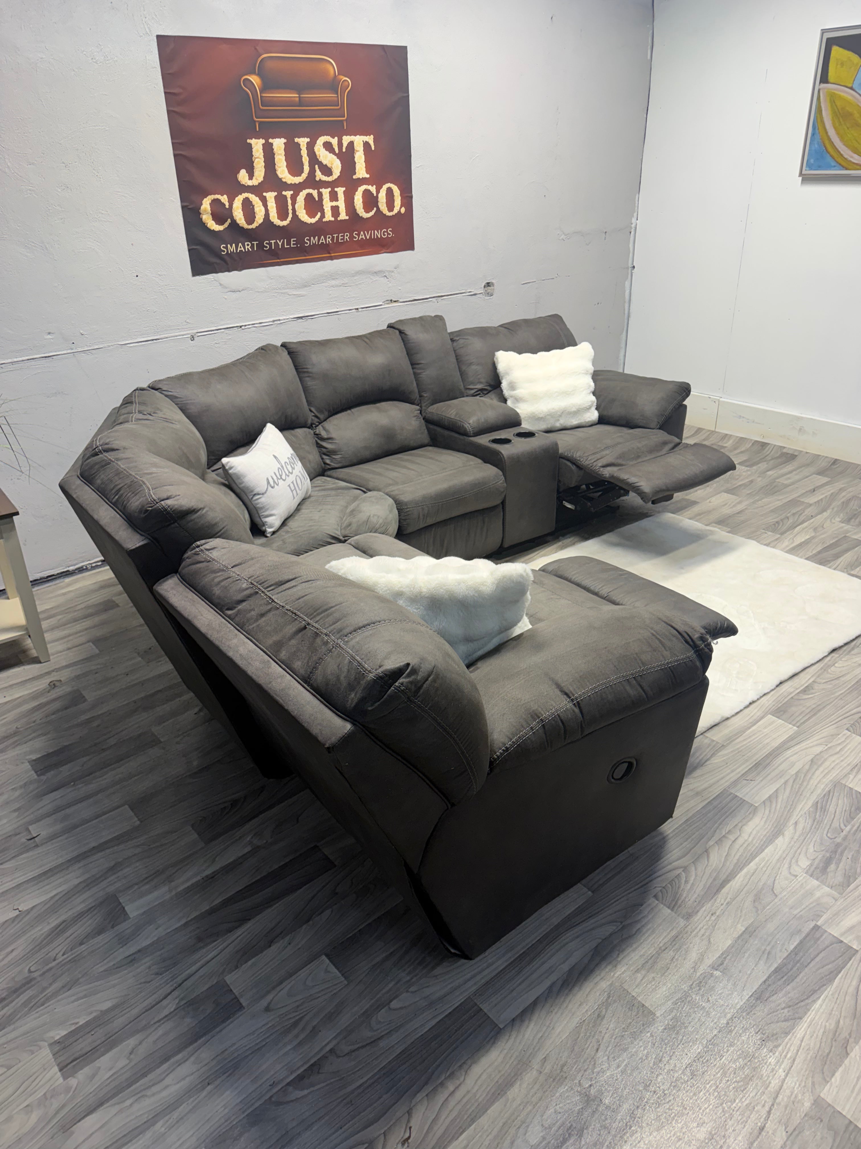 Ashley Furniture Tamboo Gray Reclining Sectional Couch