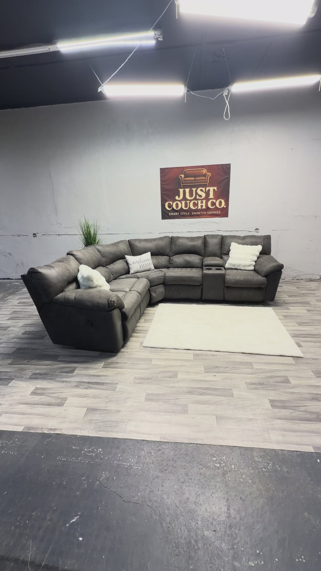 Ashley Furniture Tamboo Gray Reclining Sectional Couch